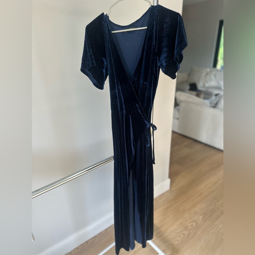 Blue velvet wrap dress with high slit and v neck
